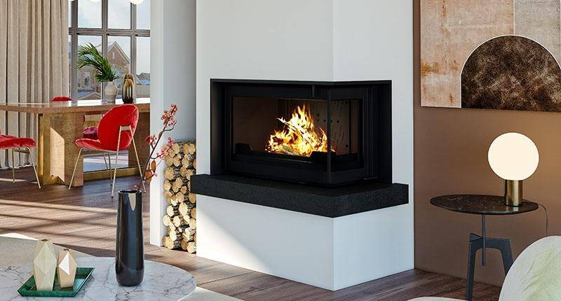 La cheminée en granit noir poli